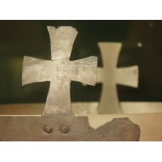 Cross on a metal crown